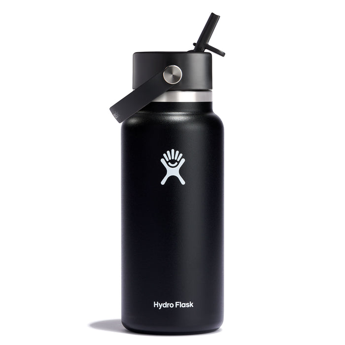 The black Wide Mouth Bottle with Flex Straw Cap, 32 oz by Hydro Flask features double-wall insulation for temperature control, a leakproof straw cap, a small handle with a rotating component, and is adorned with the brands stylized white figure and Hydro Flask printed at the bottom.