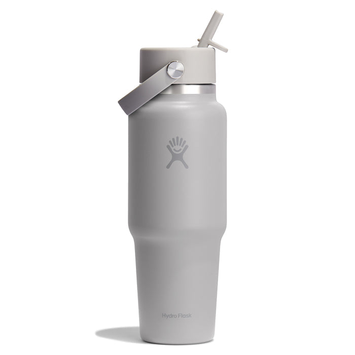 A 32 oz gray Hydro Flask Wide Mouth Travel Bottle with a Flex Straw Cap and carrying handle. The bottle, featuring the brands logo at its center, stands upright against a plain white background.