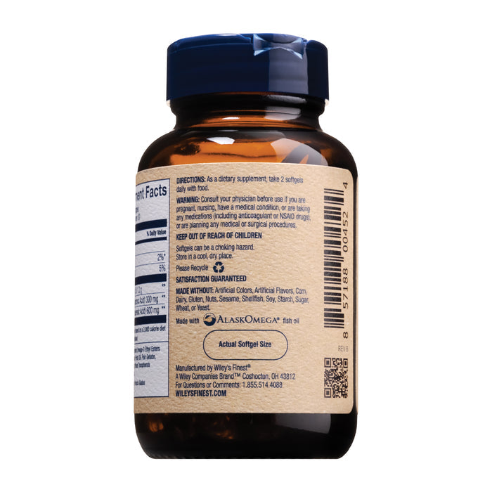 A brown bottle labeled Wild Alaskan Fish Oil - Peak DHA by Wileys Finest provides dosage instructions and manufacturing details. The beige label with black and blue text emphasizes Omega-3’s role in brain health. A dark cap and barcode complete the packaging for easy scanning.