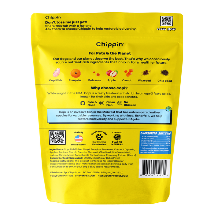 The back of the bright yellow Chippin Wild-Caught Fish & Pumpkin Dog Treats bag displays ingredients like Copi fish, pumpkin, molasses, apple, flaxseed, and chia seed. It highlights sustainable fishing practices, omega-3 benefits, contact info, branding, and sustainability certification badges.