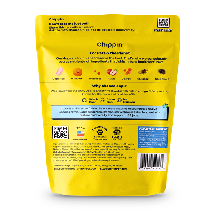 The image shows the back of a yellow Chippin Wild-Caught Fish & Pumpkin Dog Treats package, listing ingredients and nutritional information. Icons highlight sustainable fishing and eco-friendliness. The use of local USA copi fish, high in omega-3s, underscores Chippins commitment to sustainability.
