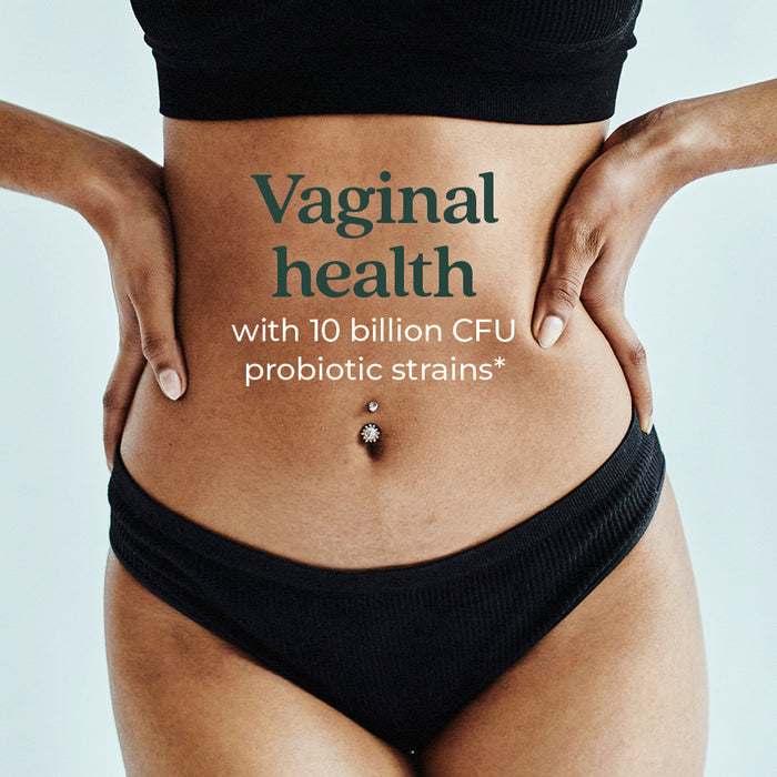 A person stands with hands on hips, wearing black underwear. The text on the image reads, "Vaginal health with 10 billion CFU probiotic strains*." The person's midriff is visible with a pierced navel.