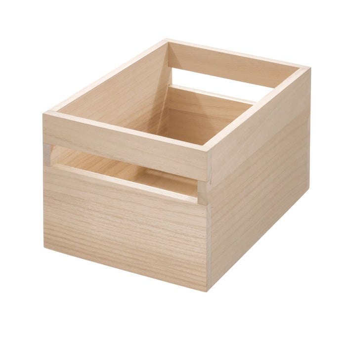 A small, empty Wood Handled Bin by iDesign appears on a white background. Made from renewable Paulownia wood with open side slats, it has a simple, rectangular design and looks handmade. Perfect for versatile organization needs.