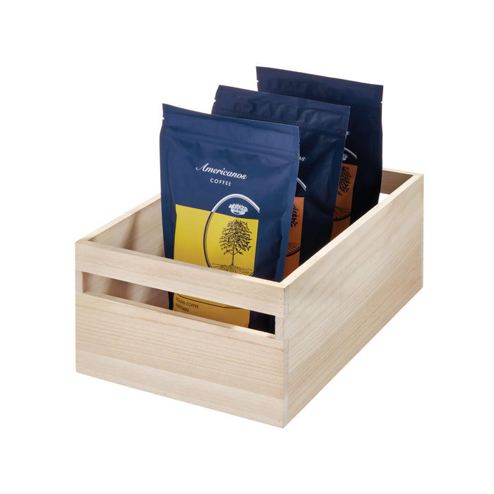 The iDesign Wood Handled Bin crafted from renewable wood includes three sealed coffee bags with blue and yellow designs, featuring a stylized tree logo and the word Coffee, bringing both sustainability and style to your kitchen.