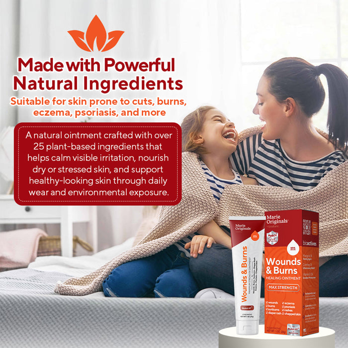 A smiling woman tucks a happy child into bed. Beside them, a tube and box of Marie Originals Wounds & Burns Cream highlight its natural healing for cuts, burns, eczema relief, and other skin concerns.